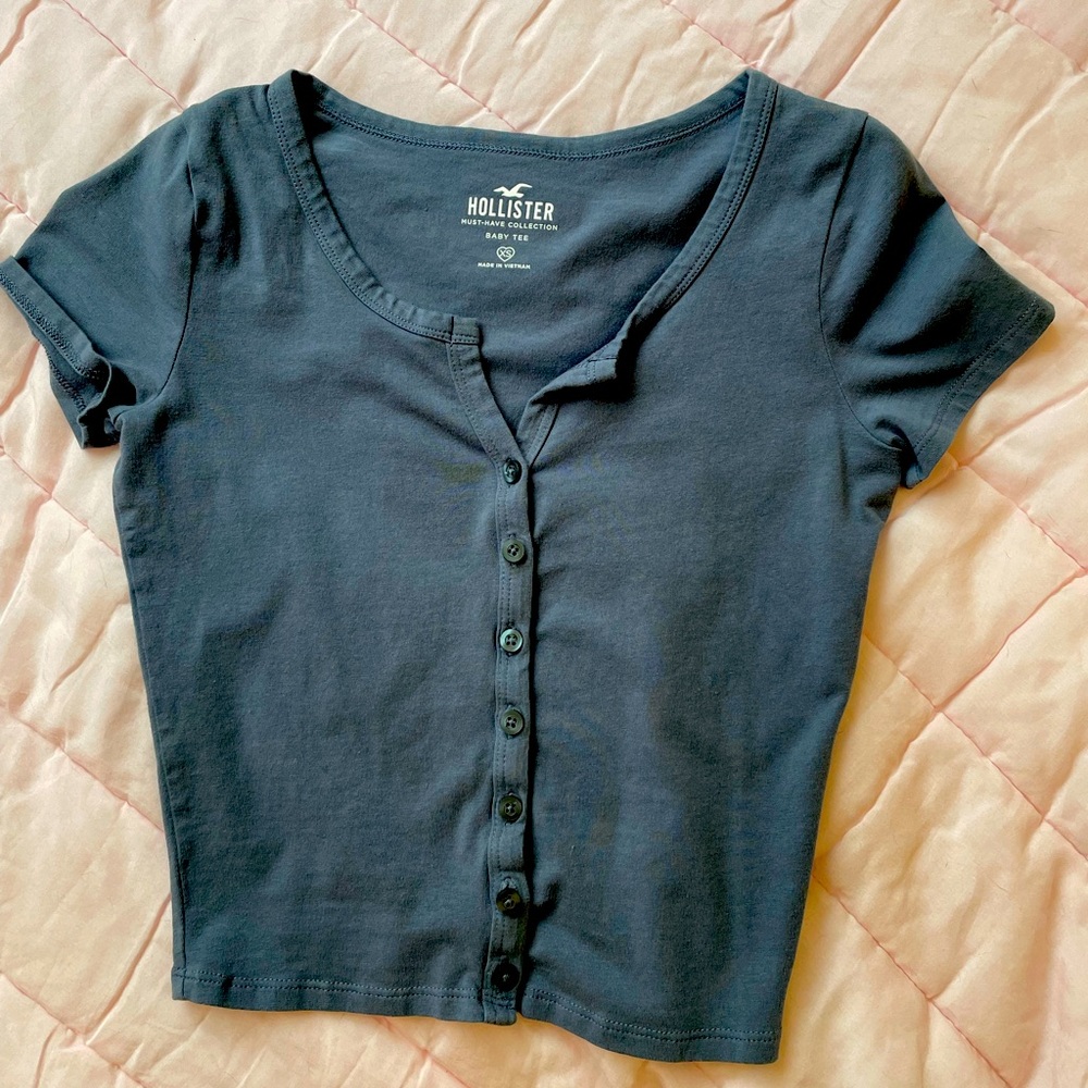 Blue/Gray button up Baby Tee from the Must Have Hollister Collection.